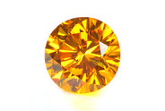 0.27 carat Round cut Fancy Vivid Orange Yellow diamond