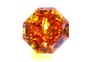 0.84 carat Radiant cut Fancy Deep Yellow Orange diamond