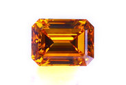 0.69 carat Emerald cut Fancy Orange Cognac diamond
